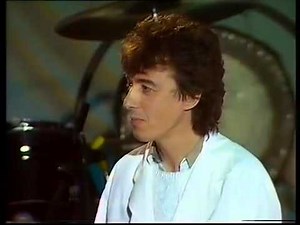 Bill Wyman With Professor Stanley Unwin In UK TV's 'Weekend In Wallop' (1984).