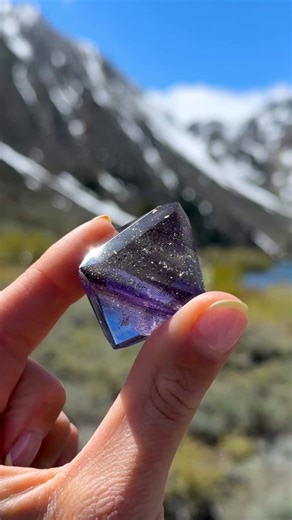 Magical Fluorite Octahedron (Part 2)This one is packed with glittery Marcasite inclusions that shimmer in the light. It is so gemmy and clear with purple phantoms that make it feel like a piece of the cosmos. Cleaved and hand polished from an old collection. Cave-In-Rock, Illinois