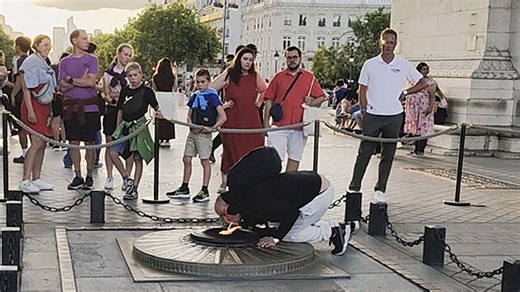 Man sparks outrage lighting cigarette with eternal flame at Arc de Triomphe