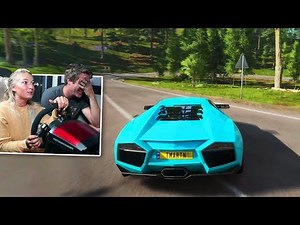 Girlfriend tries racing simulator..