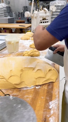 1.2K views · 25 reactions | The magic of our Lovefeast Buns—a slightly sweet roll traditionally made with a hint of orange zest, mace, and nutmeg. They're not just bread; they are a piece of history and a tradition of fellowship and unity. ❤️ This time of year, we bake thousands of these so you can bring this tradition (or just an incredibly delicious, comforting bun!) to your family table. :六‍ | Mrs. Pumpkin's | Facebook
