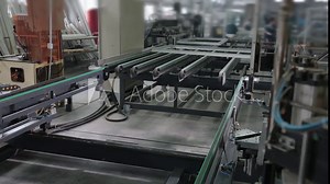 Modern workshop for production plastic and metal windows and doors with professional specialized equipment. Line production of plastic windows. Plastic window frames move along the production line. Stock Video