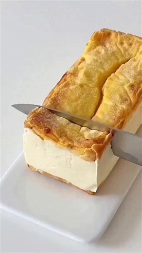 Creamy puff cake 🥰 custard preparation take a saucepan egg yolks 3 corn starch 25g sugar 30g mix well boil on low heat add hot milk 300ml mix well until thickened butter 30g whipped cream 130g mix well cover the cream let it cool refrigerator for 3 hours puff preparation take a saucepan butter 60g water 60ml sugar 5g salt 2g boil on low heat until start boiling cake flour 80g mix well for 2 min remove from the heat let it cool eggs 3 mix well mold size 80x175x60 Bake in a preheated oven 200C 18