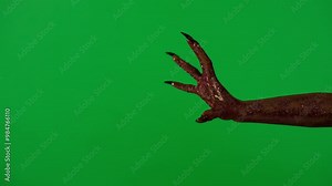 Creepy halloween monster hand in glitter slime crawling moving fingers scratching gesture, isolated on chroma key green screen background, workspace mockup.