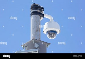 Security cam for video surveillance, blue background Stock Photo - Alamy