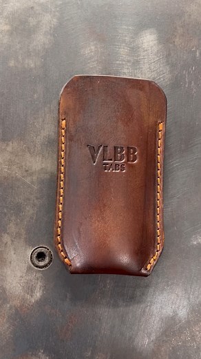 3.3K views | A modern classic for your everyday carry. This leather sheath, made by VLBB TABS, combines rugged style with meticulous design. #VLBBTABS #LeatherGoods #EDC #EverydayCarry #LeatherSheath #PocketDump #QualityDesign #MadeToLast #PocketKnife #SmallBusiness #MachineStitched | Vlbb tabs | Facebook