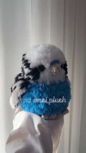 Crochet a Colorful Wavy Parrot Toy