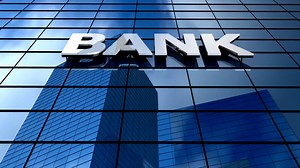 Modern bank building with reflective glass exterior in the city | Premium Stock Video Footage