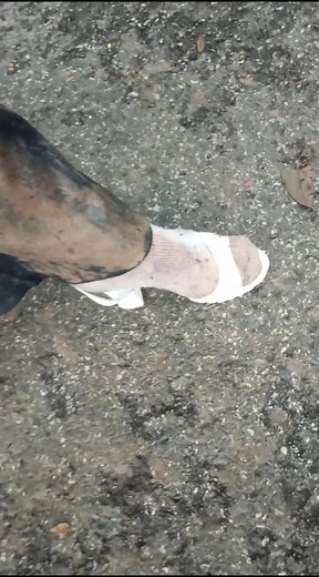 Outdoor Mud Fun: People Enjoying a Playful Gathering