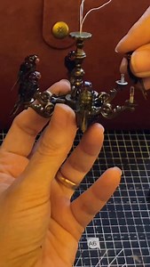 My dollhouse Tiffany style parrot chandelier bringing some color and light into a winter evening.. #esthersminiatures #dollhouseminiatures #tiffanystyle #parrotchandelier #puppenhaus | Esther's Miniatures