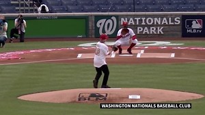 Science of the ball and stick. US infectious disease specialist Anthony Fauci throws the ceremonial first pitch at the Washington Nationals' game against the New York Yankees to open the Major League Baseball season. | AFP News Agency