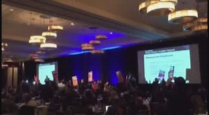 Protesters disrupt hedge fund conference