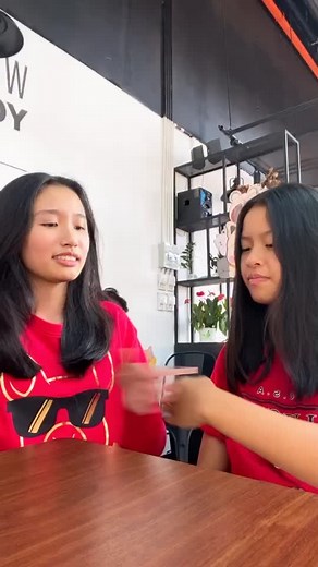 Sign Language Game Between Two Friends