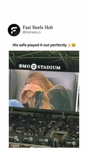 Fast Reels Hub™ on Instagram: "😂😂😂 The video captures a humorous moment at BMO during a soccer match, where actor Seth Green and his wife are featured on the jumbotron under the label "SETH GREEN AND HIS WIFE." Seated in the stands amid a cheering crowd wearing black and yellow team colors, the couple initially appears relaxed. Suddenly, the wife grabs Seth by the shirt, shaking him dramatically while pointing accusingly, her face contorted in mock anger. Seth reacts with wide-eyed surprise, 