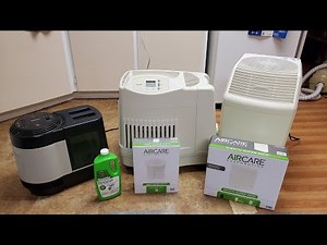 Three vintage evaporative humidifiers - Holmes HM-2060, MoistAIR MA12000, Bemis 826900