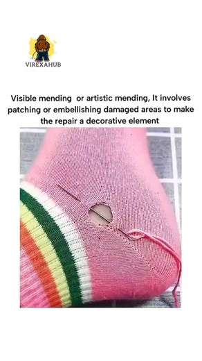VIREXAHUB on Instagram: "The post illustrates visible mending, a sustainable repair method originating from Japanese sashiko techniques, where a hole in a striped sock is artistically patched with pink thread embroidery forming a Star of David. With nearly 2 million views and 9,000 likes, it highlights growing interest in eco-friendly fashion, though replies mix admiration for creativity with humorous or pointed comments on the repair's Jewish/Israeli symbolism. Visible mending reduces textile w