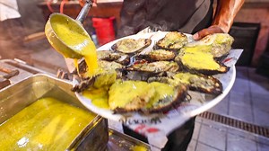 Insane FIRE OYSTERS!! 🦪 🔥 Don't go to New Orleans without EATING THIS!! 📍 Drago's Metairie #neworleans #oysters | Migrationology