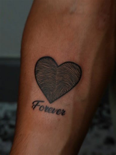 A fingerprint heart tattoo that symbolizes love, connection, and forever bonding. Perfect for couples, partners, or family tattoos with deep emotional meaning. Minimal, personal, and timeless tattoo design. . . . . fingerprint heart tattoo couple fingerprint tattoo heart tattoo meaning unique couple tattoo love symbol tattoo minimal heart tattoo fingerprint love tattoo #FingerprintTattoo #FingerprintHeart #CoupleTattoo #HeartTattoo #LoveTattoo