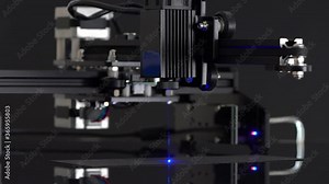 Modern Laser Cutting CNC tool. Automation High precision laser manufacturing of parts. Close up computer cnc on dark background.