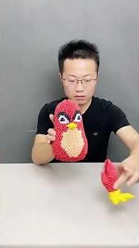 Use more than 8,000 pieces of waste paper to make an owl for you. Do you think it looks like an owl?