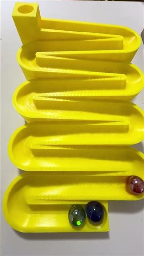 Artistic marble rolling on the marble run