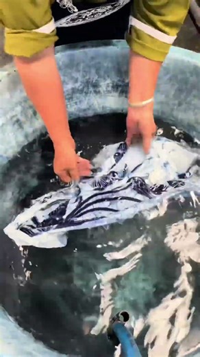 Wax printing reverse painting presents a white background, blue patterns, very beautiful