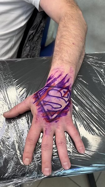 Superman Logo Freehand Tattoo Design