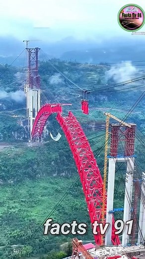 "The World's Longest Steel Arch Bridge! 😱🏗️ China's Fenglai Marvel Towers 310m Above a Depth #China #fblifestyle #facebookviral | facts tv 91