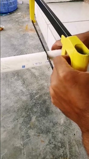 Cutting pvc pipe with hacksaw
