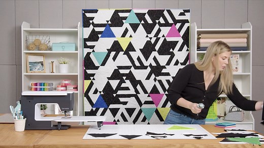 Bright colors and geometric shapes earn an A in the Saved by the Bell quilt! Made with Charisma Horton’s Chicken Scratch fabric line for Timeless Treasures, this vibrant quilt is perfect for teens or anyone who loves bold, energetic color and design. Watch the Saved by the Bell tutorial now: https://bit.ly/ahwm_savedbythebell_fb | Quilting Deals - Missouri Star Quilt Co