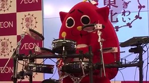 Watch a giant Japanese kid’s TV character play death metal in a shopping mall