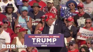 Watch moment Donald Trump ducks as loud bangs heard at rally