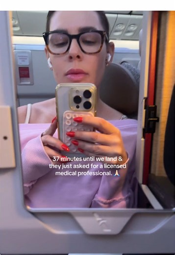 EMT Assists Passenger on International Flight Landing