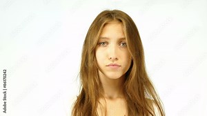 Cheerful girl eating cake