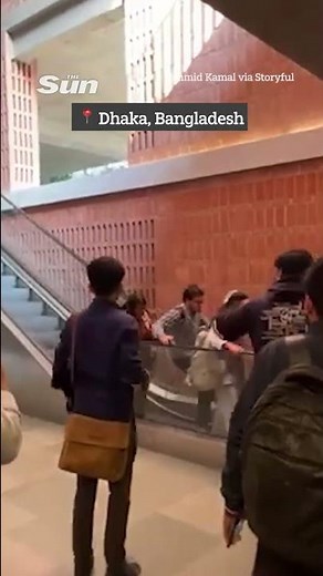 Moment escalator goes HAYWIRE forcing students to jump off #viral