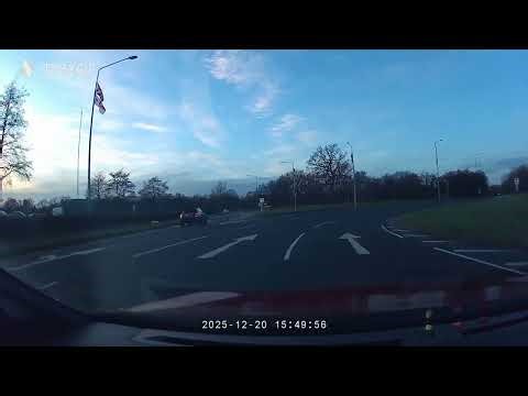 Straightening the curve: safe slewing (“lane-sliding”) through roundabouts