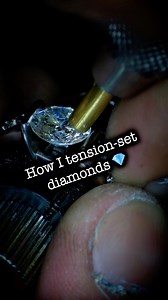 A little “step-by-step” action on how I tension set diamonds 💎 This method requires a really good understanding of metal & stone hardness, along with pinpoint accuracy at the bench…. and it’s still freaking nerve-wrecking 😬 Over-cutting = a stone that’ll never tighten 🤬 Under-cutting = a chipped diamond 😭 But if done correctly….the end result creates the illusion of a floating diamond 🪄 perfect for this chunky/modern/sexy custom engagement ring 😉🥂 #handcrafted #tensionsetdiamond #modernen