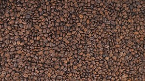 Rotating coffee beans texture - Free Stock Video