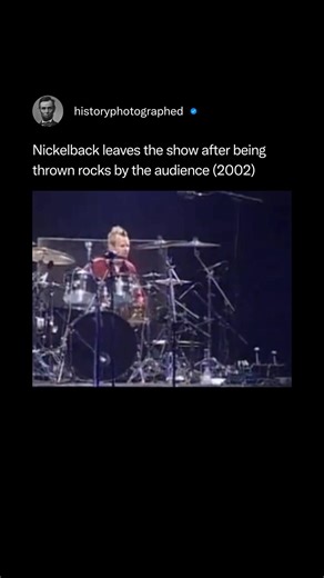 Nickelback was forced to end their performance prematurely at the 2002 Ilha do Ermal festival in Portugal after an angry crowd began pelting them with rocks and bottles. After the lead singer was struck in the back of the head, the band walked off stage, famously flipping off the audience as they exited. Credit: SIC | History In Pictures