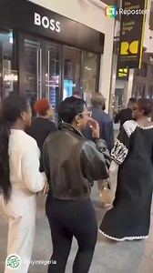 Burna Boy's mum and his team spot his new Hugo Boss ad..... | Dj Abass