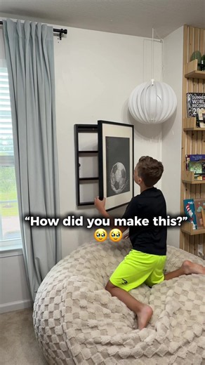 Earlier mornings are officially here now that my oldest is in middle school, so I built this hidden picture frame cabinet to save our bedtime routine! 🤫 How I made it 👇 Built a shallow box to fit behind our frame using a 1x3, screws, hinges, and a catch magnet. Filled the holes, sanded, and painted it to match. Mounted it securely into the studs! We keep our @OLLY Wellness Kids Sleep gummies in here for whenever the kids are feeling too giddy at bedtime to be back in school 😴 Would your kids 