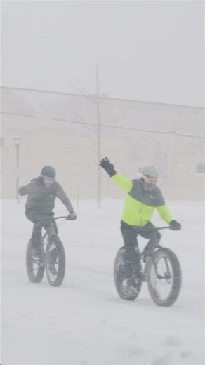 Just Wisconsin things going on in downtown De Pere during a blizzard. ❄️🚴