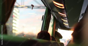 Passenger perspective inside bus. POV of person traveling by bus in 4K