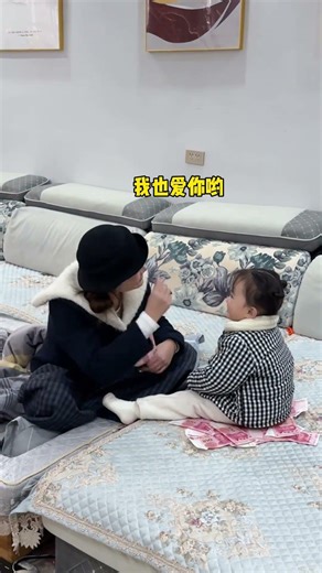 Father and 2-year-old child work together to get mom's pocket money