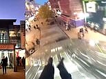 Daredevil slides down the roof of shopping centre to escape security