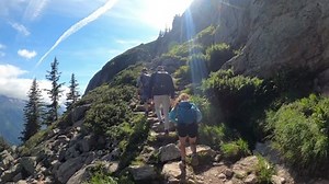 Lac Blanc, Chamonix, France, September 3, 2021: hiking. Hiker reach Lac Blancs in Chamonix France. One of the most popular destination for hikers in Chamonix