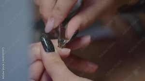 Manicurist Cutting The Hangnail Of Customer Using Cuticle Nipper. - closeup Stock Video