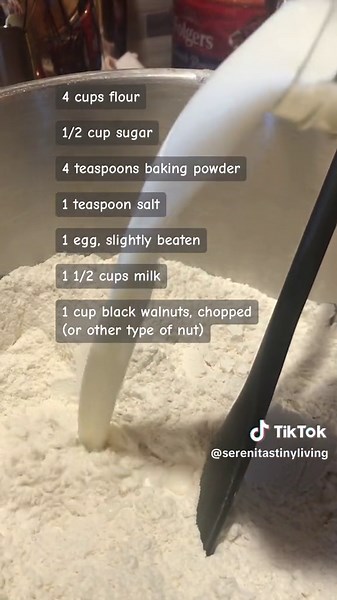 Black Walnut Bread (Nut Bread) 4 cups flour 1/2 cup sugar 4 teaspoons baking powder 1 teaspoon salt 1 egg, slightly beaten 1 1/2 cups milk 1 cup black walnuts, chopped (or other type of nut) Preheat oven to 350° F. Grease two loaf pans. Put the flour, sugar, baking powder, and salt into a mixing bowl, and stir to combine. Add egg and milk, and stir just enough to blend the ingredients. Add the black walnuts, and gently stir to spread the nuts throughout the batter. Pour into the greased pans. Ba