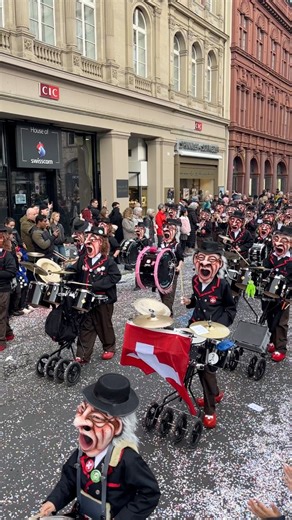 Basel is in full swing for Fasnacht! The streets are alive with parades, drums, creative masks and wagen!😍🎉 #baslerfasnacht #fasnacht #Fasnacht2026 #baselswitzerland #basel #baselswizz #BaselMarktplatz #fasnachtumzug | Basel with Loverach