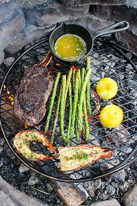 Bison Ribeye and Lobster Tails with a herb butter sauce. Need I say more?! 🍖 🦞 🌿 🔥 . How about a little surfin’ and some serious turfin’?! We’re coming at you today with a Bison Ribeye and Lobster Tails Recipe. This bone in, bison ribeye was incredible! I broke out the mortar and pestle to grind and smoothing a simple seasoning for the ribeye. Then I topped both the lobster and bison ribeye in an herb butter sauce. I hope y’all never get tired of herb butter… because I don’t think I ever wil